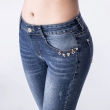 low waist holed denim jeans